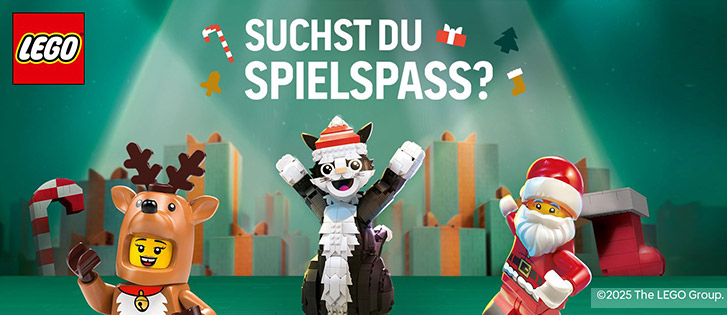 Lego Weihnachtliche Lego-Figuren, ein Rentier, ein Nikolaus vor festlichem Hintergrund