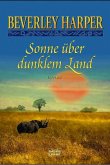 Sonne über dunklem Land