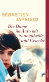 Die Dame im Auto mit Sonnenbrille und Gewehr