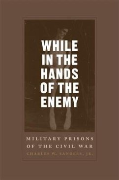 While in the Hands of the Enemy - Sanders, Charles W