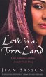 Love in a Torn Land: One Woman's Daring... - Bild 1