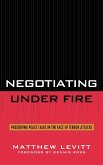 Negotiating Under Fire