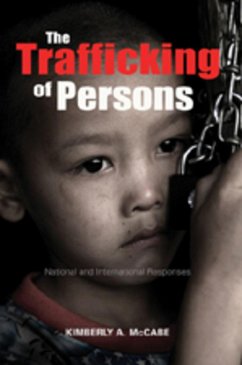 The Trafficking of Persons - McCabe, Kimberly A.