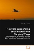 Flowfield Surrounding Small Photodriven Flapping Wings