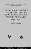 The Empirical Evidence on the Efficiency of Forward and Futures Foreign Exchange Markets