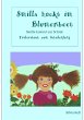 Smilla hockt im Blumenbeet - Bild 1