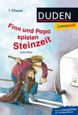 Finn und Papa spielen Steinzeit