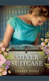 SILVER SUITCASE