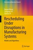 Rescheduling Under Disruptions in Manufacturing Systems