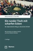 Ein runder Tisch mit scharfen Ecken Ein runder Tisch mit scharfen Ecken