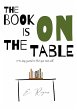 The book is on the table - Bild 1