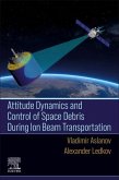 Attitude Dynamics and Control of Space Debris During Ion Beam Transportation