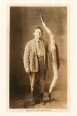 Vintage Journal Man Standing with Longhorns