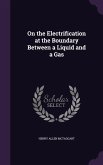 On the Electrification at the Boundary Between a Liquid and a Gas