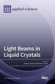 Light Beams in Liquid Crystals