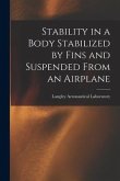 Stability in a Body Stabilized by Fins and Suspended From an Airplane