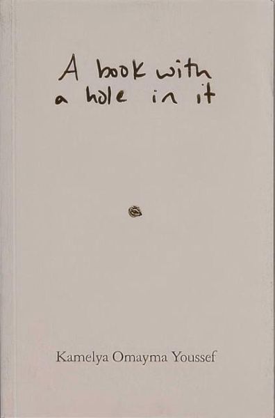 A book with a hole in it A book with a hole in it