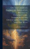 On the Charges Gained by Insulated Metallic Conductors, Surrounded by Other Conductors, and the Rela