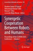 Synergetic Cooperation Between Robots and Humans