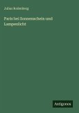 Paris bei Sonnenschein und Lampenlicht