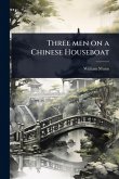 Three men on a Chinese Houseboat