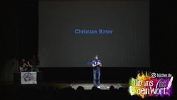 Der dritte Finalist Christian Ritter trägt seinen zweiten Text vor.